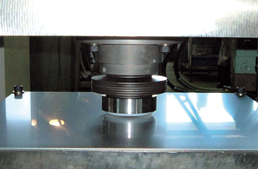 Friction slider bearing with disc spring
